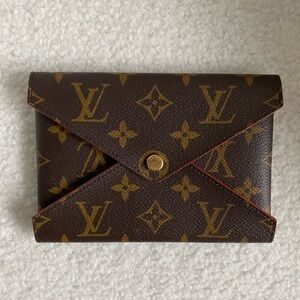 Louis Vuitton passport holder/ wallet.